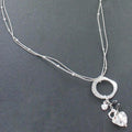Beaten Ring Necklace With Heart Charms In Silver Plate