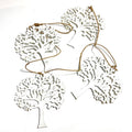 String Of Five White Wooden Trees