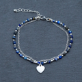 Blue Crystal Cham Bracelet In Silver Plate