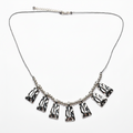 Beaten Fan Necklace In Silver Plate